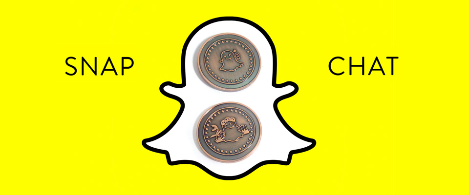 Pesonalised reversible challenge coins made for a Snap Chat promotion